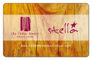 Cedar House & Stella logos on a wood testured background.